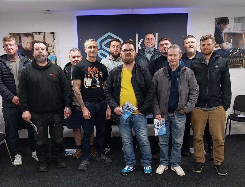 Group of people indoors at Skills Training Group